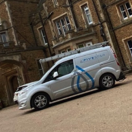 Five Star Cleaning Company van outside large residential property
