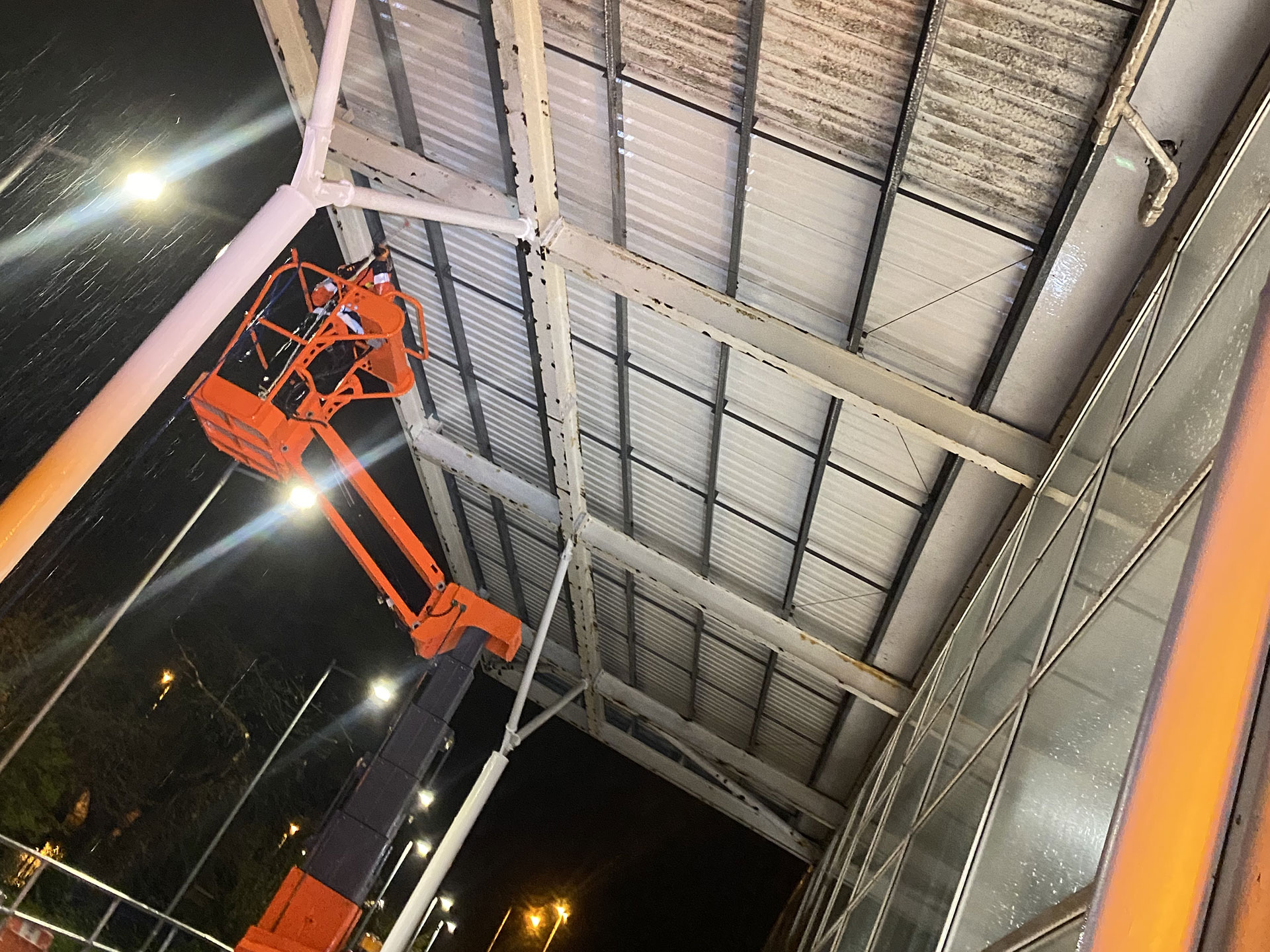 Cleaning a high industrial roof